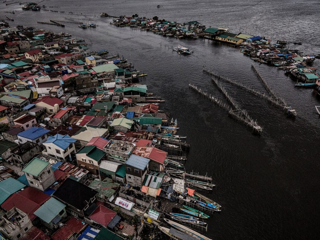Every square meter of space, not all dry, is covered by a building or a dock. Binuangan Island, on the left, is separated from Salambao Island (right) by a channel called the Muzon River.  Credit: James Whitlow Delano